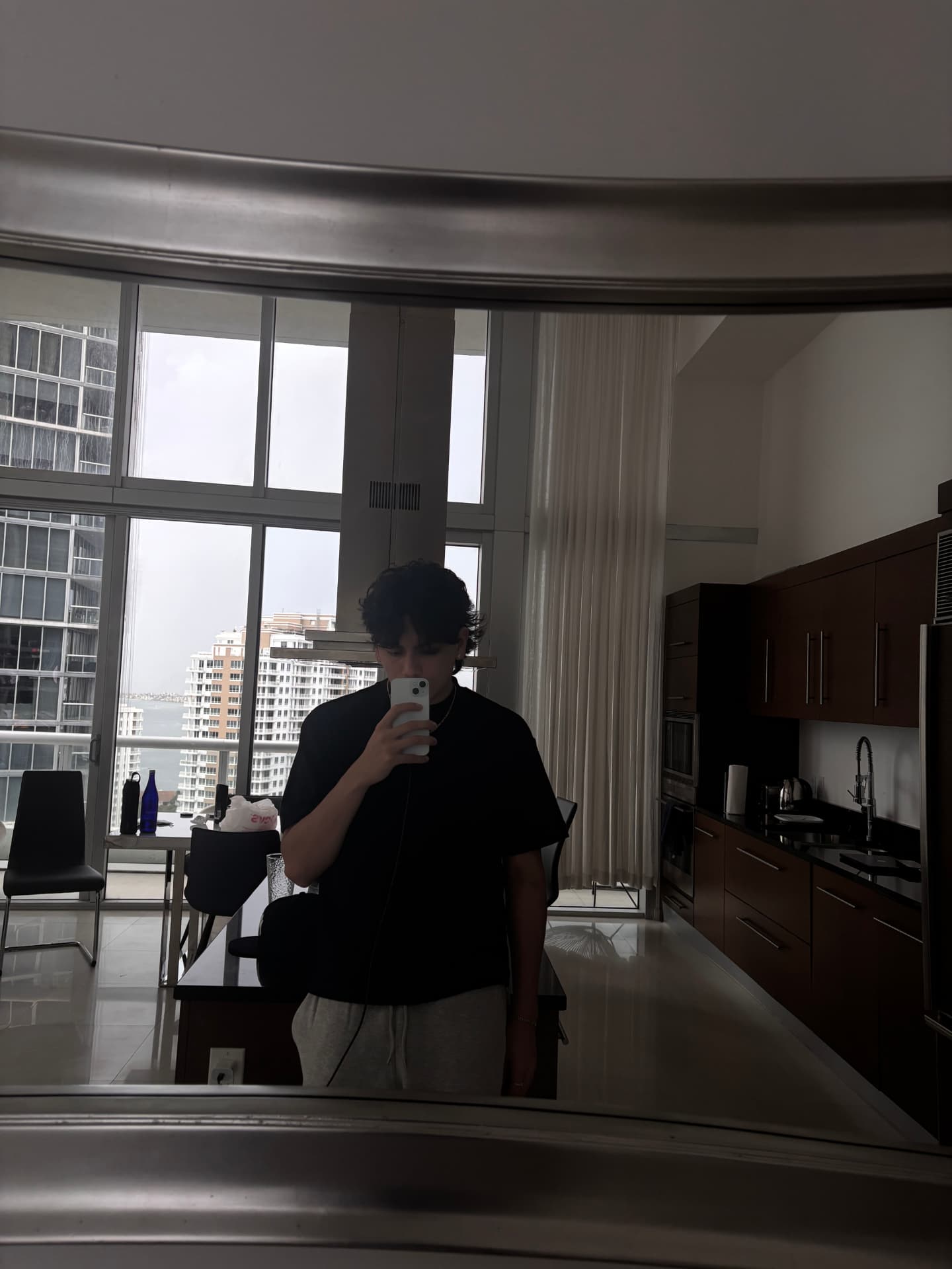 Brem taking a photo of himself in a mirror